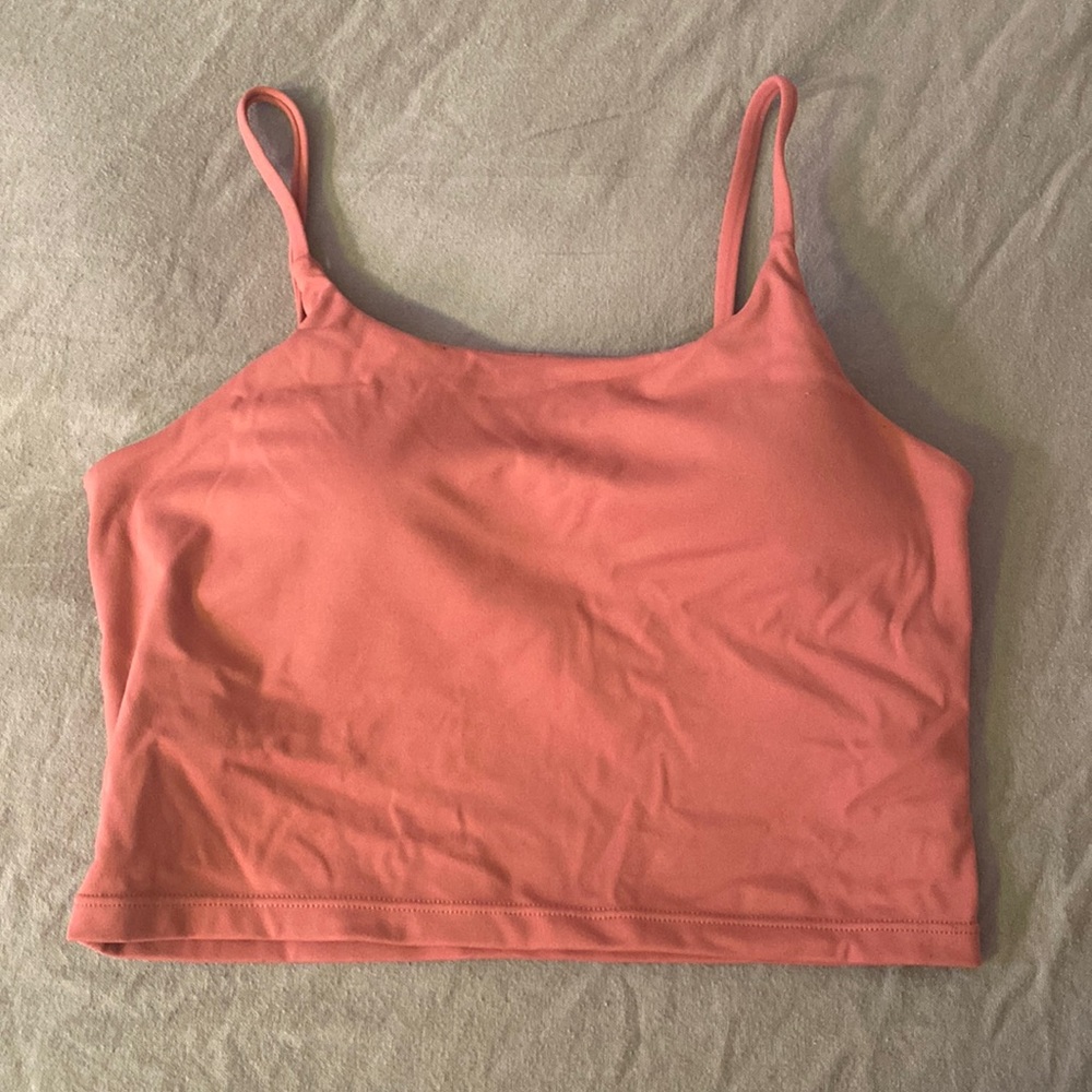 Hot pink workout top with built in shelf bra